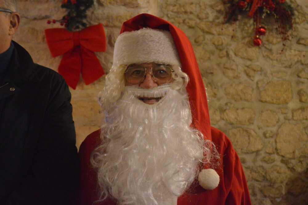 Vittorio Sensi nelle vesti di Babbo Natale