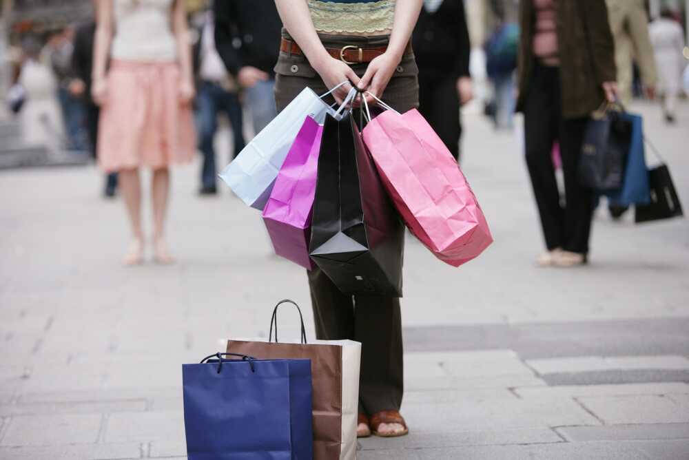 hands with shopping bags